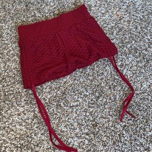 Red textured scrunch booty shorts